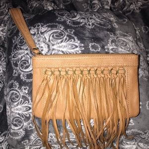 Carlos Santana wristlet